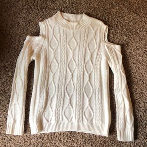 Cloud chaser white sweater with cut out shoulders.